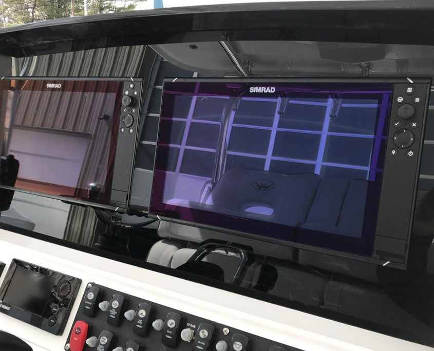 Simrad navigation equipment in boat dashboard